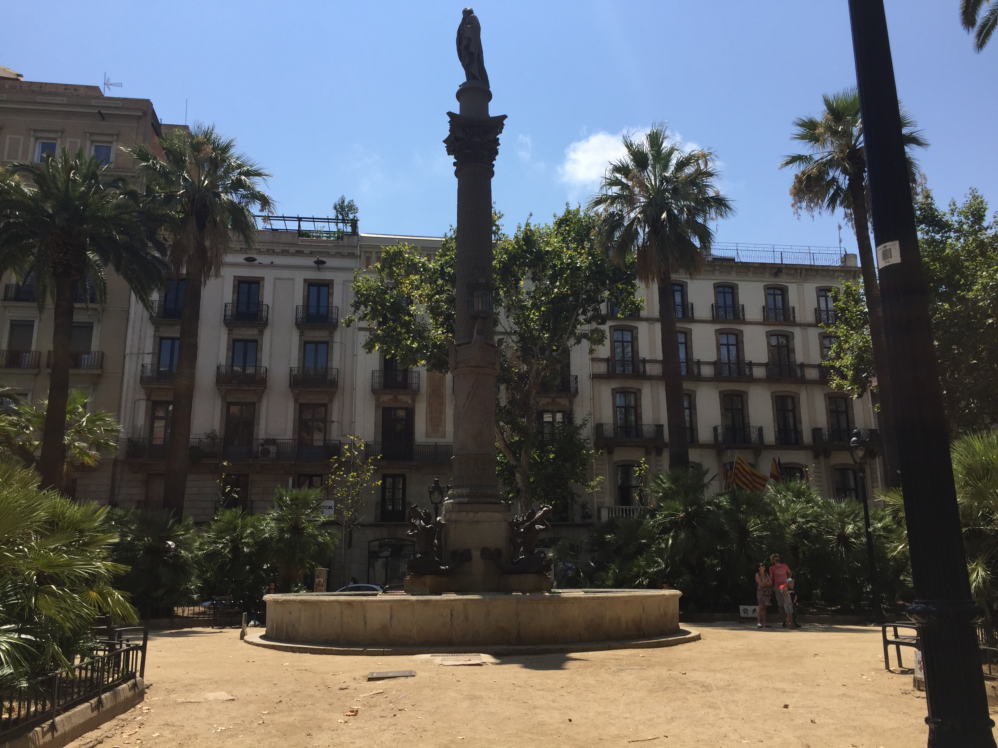 Many of Barcelona's apartment buildings are adjacent to plazas that allow residents a small park area to relax. The monument furthers the appeal.