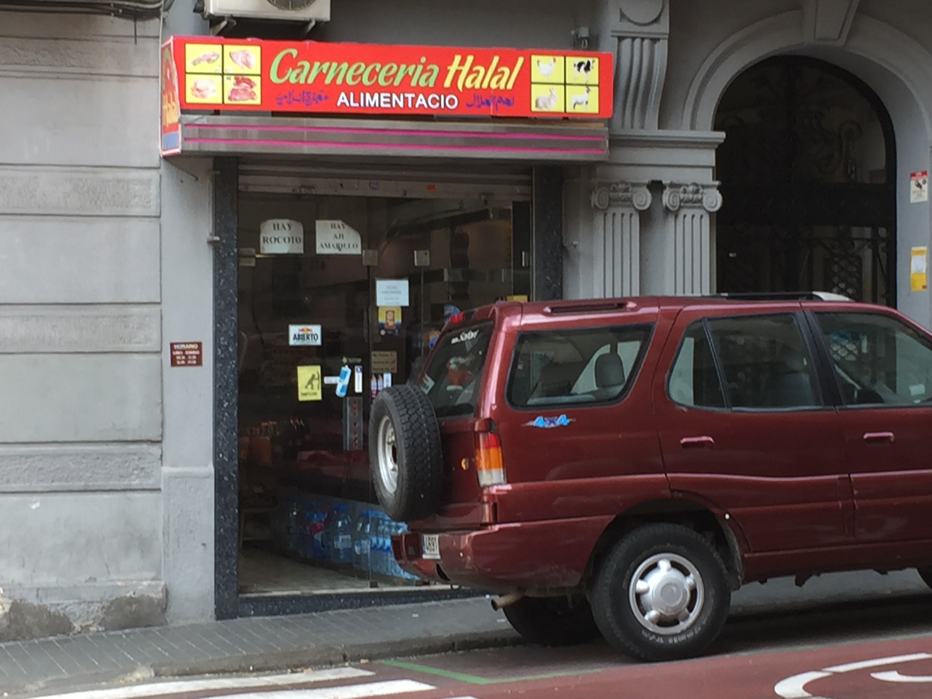 A Muslim halal carniceria in the El Raval neighborhood of  Barcelona.  Muslim were noticeably integrated within a large number of Barcelona's neighborhoods.