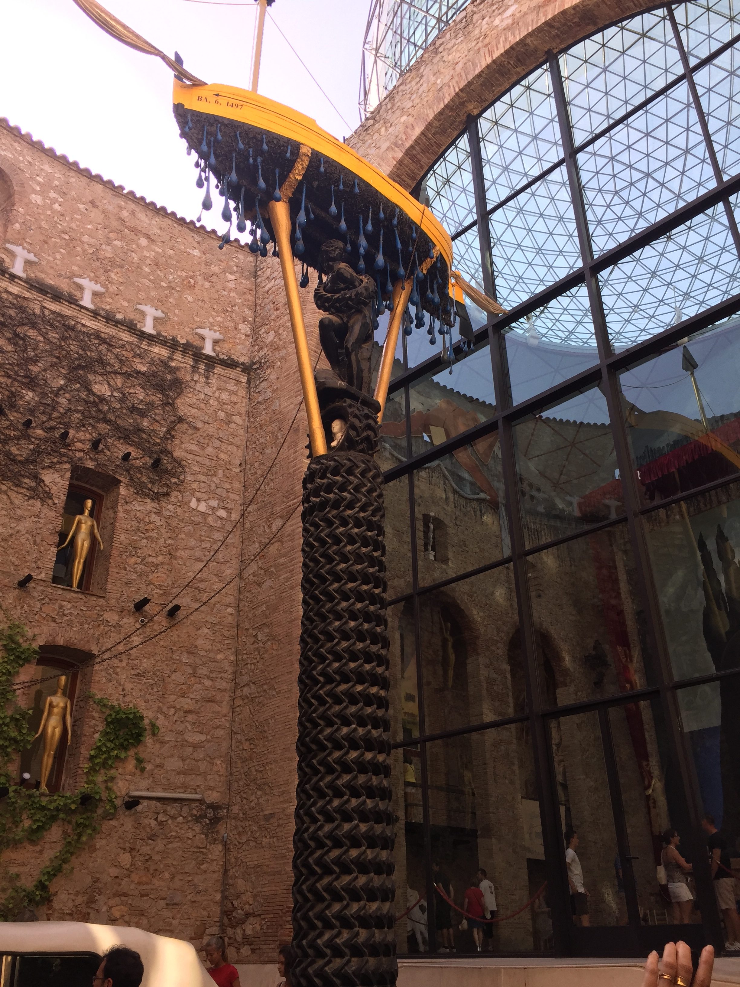 A sculpture within the main courtyard of The Dali Museum in Figueres. Salvador Dali was a prolific producer of a diverse variety of art.