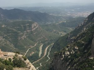As you can see from the photo, there is a significant distance between Montserrat Mountain and the nearest town.