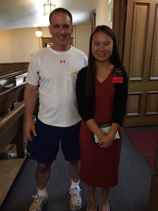 Mark posing with Sister Huang from China. Sister Huang discussed her experience with religious restrictions in China. She told a compelling story of her family having to practice their religion in secret to avoid prosecution. She is presently in Salt Lake City on a 2-year mission. Then, she intends to return to China.