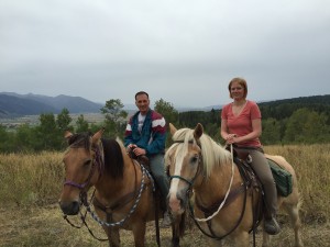Mark and Lizzy pretending be a cowboy and cowgirl. Lizzy was a competition rider in her youth. Mark was a city boy. Alpine, WY..